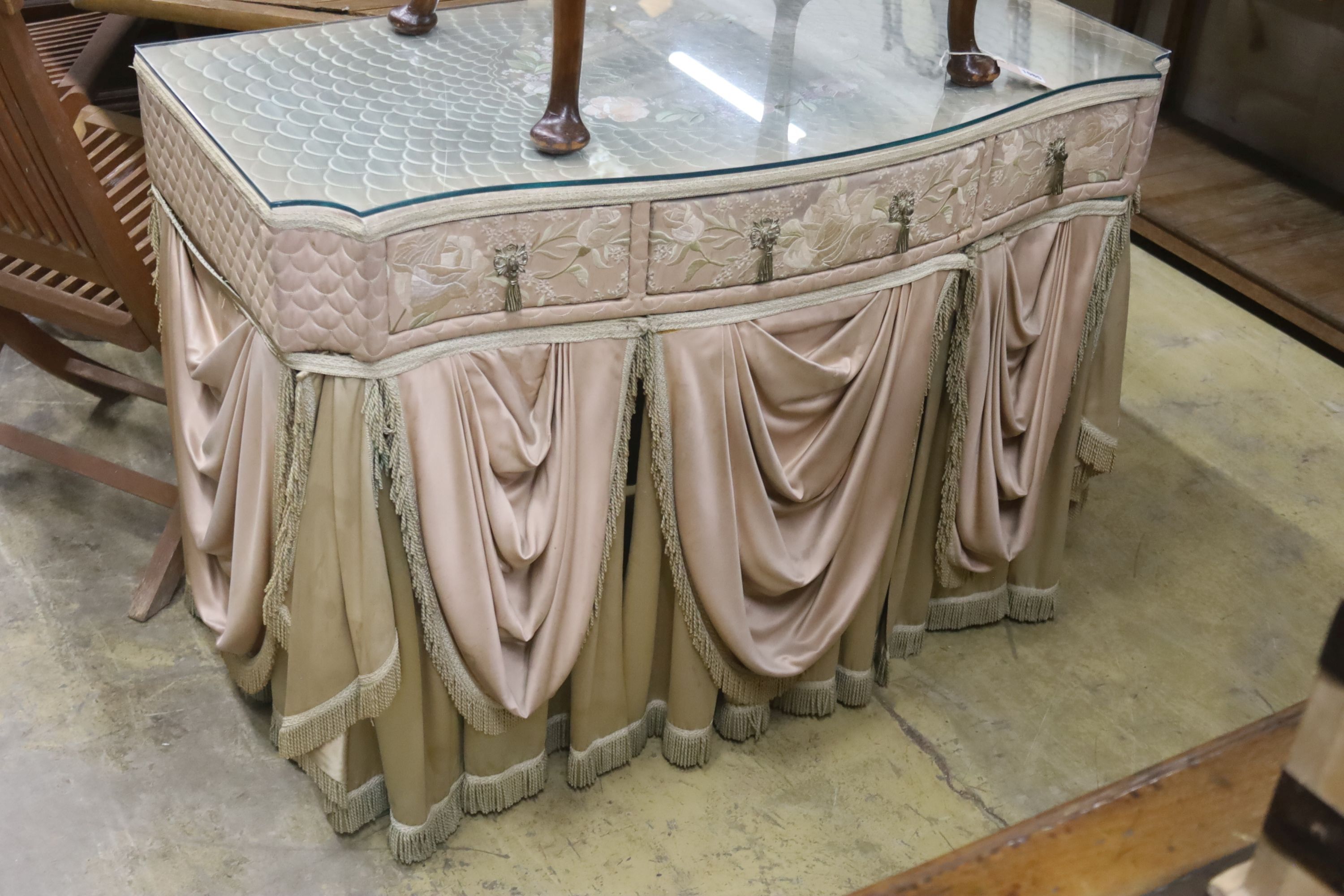 An embroidered silk mounted dressing table, width 110cm, depth 54cm, height 77cm, together with a stool